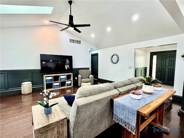 3391 Rd 144, Antwerp, OH 45813 - living room with high vaulted ceiling, dark wood-style floors, a wainscoted wall, ceiling fan, and a skylight