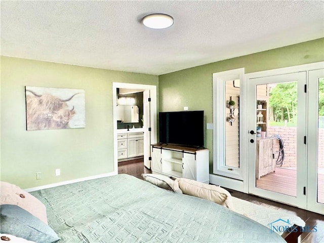 3391 Rd 144, Antwerp, OH 45813 - bedroom with access to exterior, a textured ceiling, ensuite bath, and dark wood-type flooring