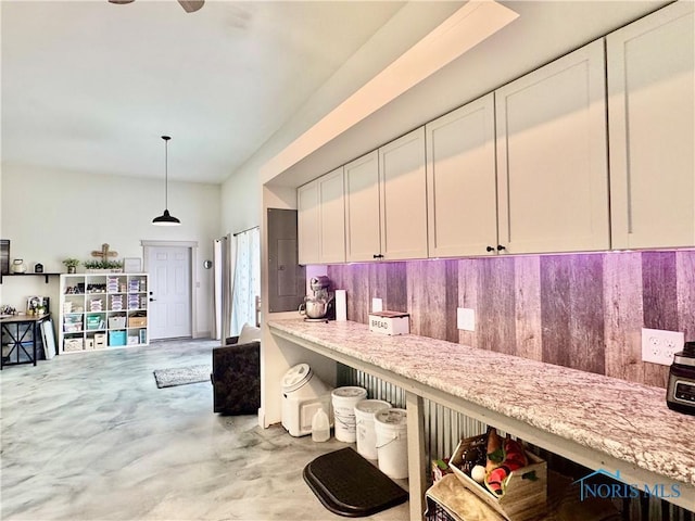 3391 Rd 144, Antwerp, OH 45813 - kitchen with white cabinetry, finished concrete flooring, electric panel, and open floor plan