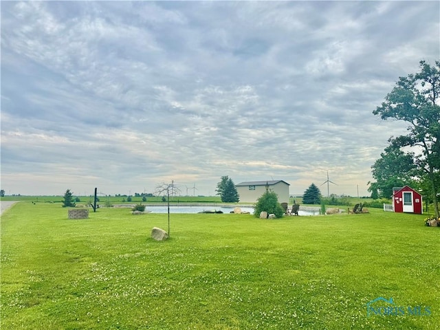 3391 Rd 144, Antwerp, OH 45813 - view of grassy yard with an outdoor structure and a water view