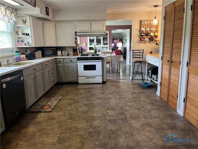 6432 State Route 576, Bryan, OH 43506 - kitchen with dishwashing machine, white range with gas cooktop, gray cabinets, under cabinet range hood, and open shelves