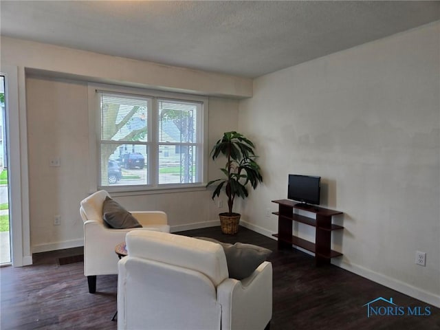 2421 106th Rd, Toledo, OH 43611 - living area featuring wood finished floors and a textured ceiling