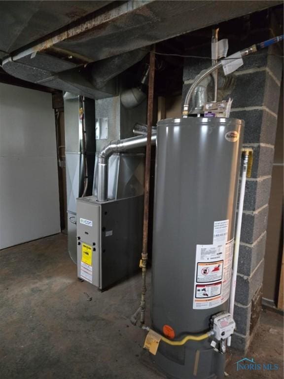 2421 106th Rd, Toledo, OH 43611 - utility room with water heater