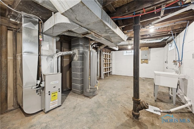 2421 106th Rd, Toledo, OH 43611 - below grade area with water heater, electric panel, and heating unit