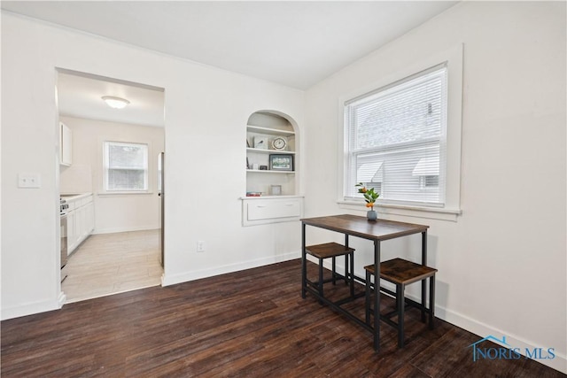 2421 106th Rd, Toledo, OH 43611 - dining space with wood finished floors and built in features