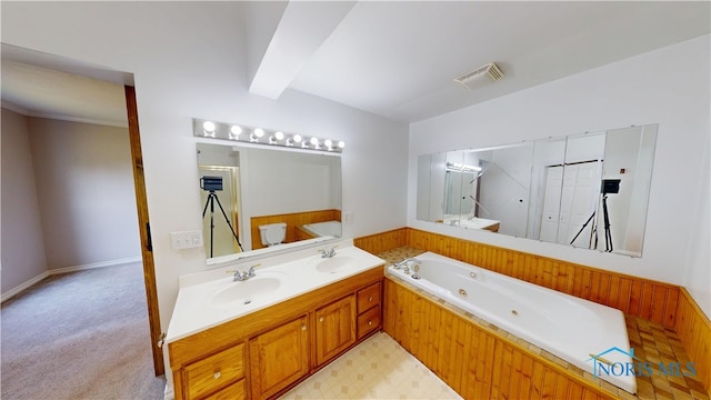 628 W Maple St, Clyde, OH 43410 - full bath with a stall shower, a jetted tub, and double vanity