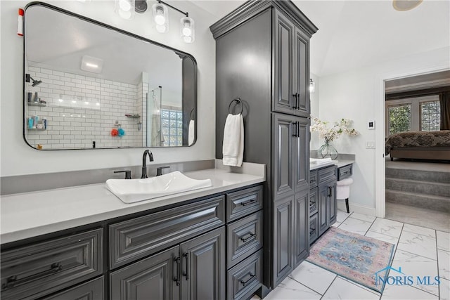 4811 Yosemite Pkwy, Sylvania, OH 43560 - ensuite bathroom with marble finish floors, vanity, and a tile shower