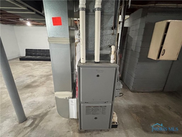 2914 118th St, Toledo, OH 43611 - utility room featuring heating unit