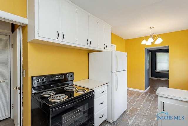 1040 Richland St, Maumee, OH 43537 - kitchen with electric range, a chandelier, white cabinets, light countertops, and decorative light fixtures