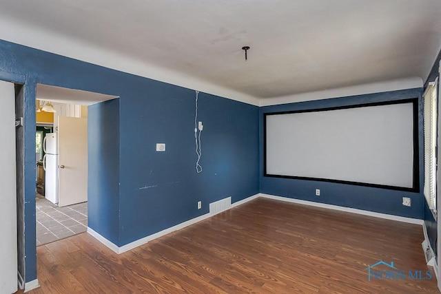 1040 Richland St, Maumee, OH 43537 - cinema room featuring wood finished floors and baseboards