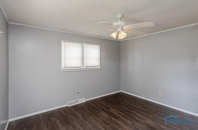1040 Richland St, Maumee, OH 43537 - spare room with a ceiling fan, ornamental molding, and wood finished floors