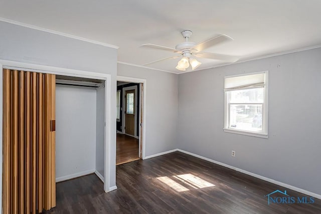 1040 Richland St, Maumee, OH 43537 - unfurnished bedroom with wood finished floors, a closet, ornamental molding, and ceiling fan