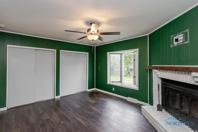 1040 Richland St, Maumee, OH 43537 - unfurnished living room with ornamental molding, ceiling fan, a brick fireplace, and wood finished floors