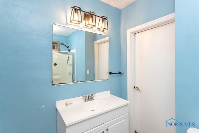 1040 Richland St, Maumee, OH 43537 - bathroom with vanity and an enclosed shower