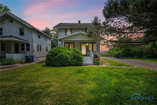 3504 Willys Pkwy, Toledo, OH 43612 - american foursquare style home featuring covered porch and a yard