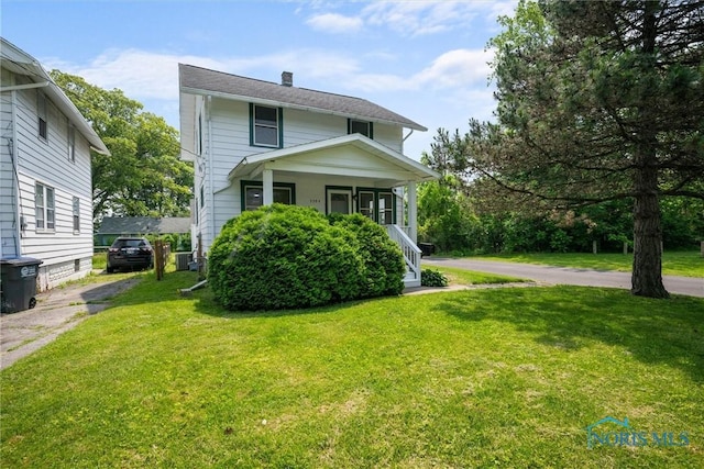 3504 Willys Pkwy, Toledo, OH 43612 - traditional style home with a front lawn and a porch