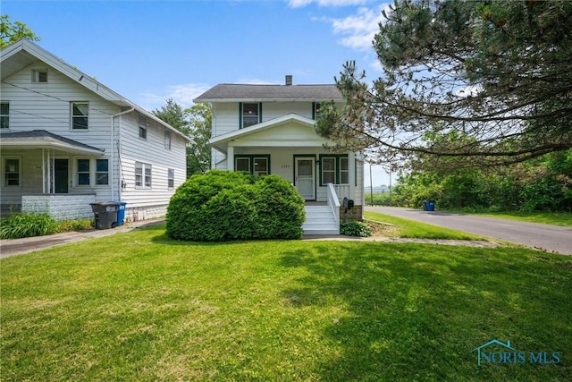 3504 Willys Pkwy, Toledo, OH 43612 - traditional style home with covered porch and a front yard