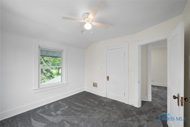 3504 Willys Pkwy, Toledo, OH 43612 - unfurnished bedroom featuring dark carpet and ceiling fan