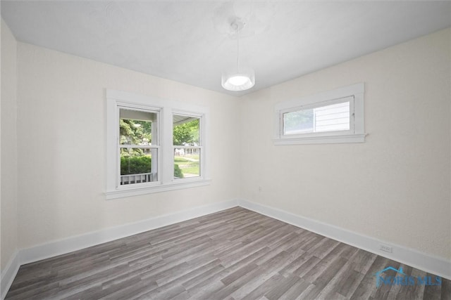 3504 Willys Pkwy, Toledo, OH 43612 - spare room featuring wood finished floors and baseboards