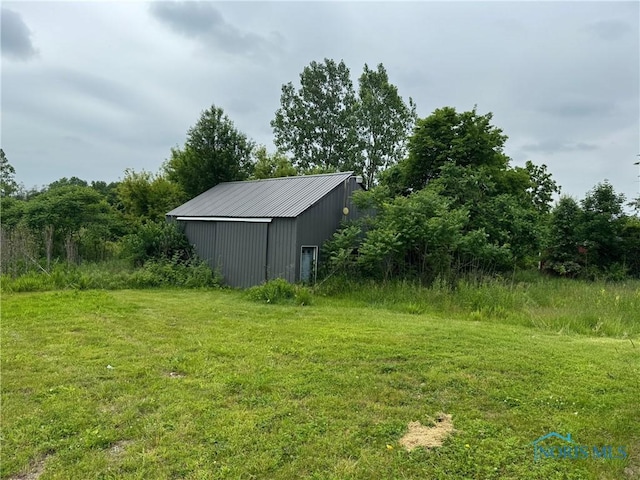 1447 US Highway 20, Edon, OH 43518 - view of green lawn with a pole building and an outdoor structure