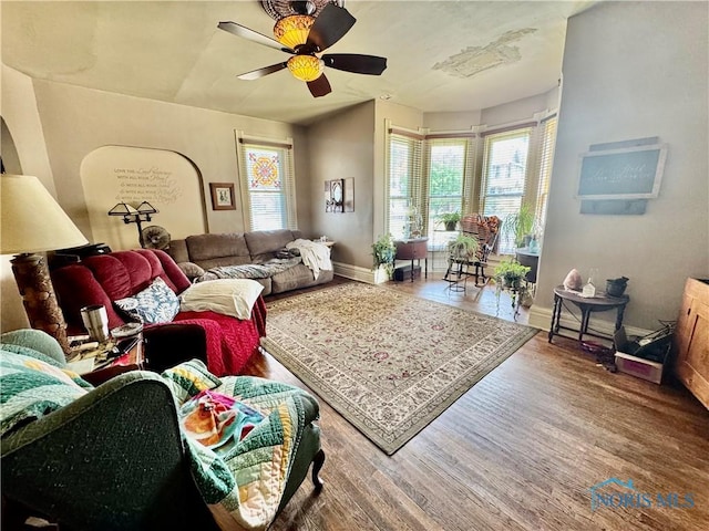 121 Columbus St, Hicksville, OH 43526 - living room featuring wood finished floors and a ceiling fan