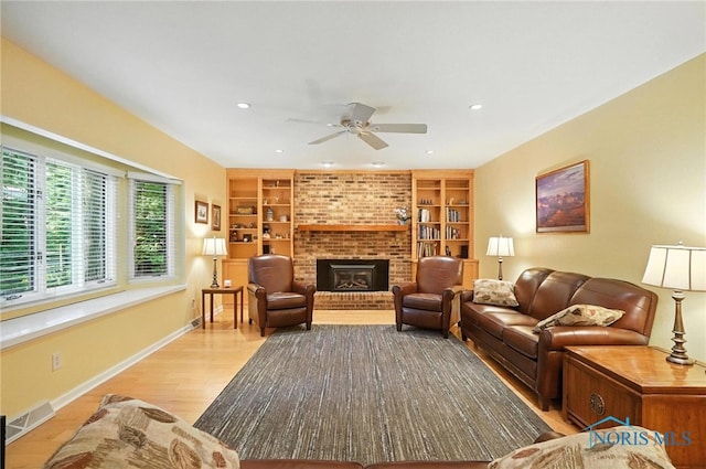 4329 Woodbriar Dr, Toledo, OH 43623 - living room featuring built in features, ceiling fan, light wood finished floors, recessed lighting, and a fireplace