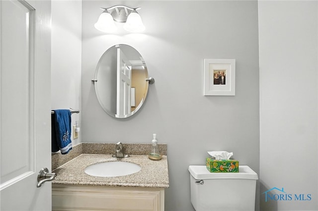 4329 Woodbriar Dr, Toledo, OH 43623 - half bathroom featuring toilet and vanity