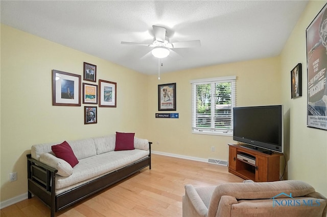 4329 Woodbriar Dr, Toledo, OH 43623 - living area with light wood finished floors and ceiling fan