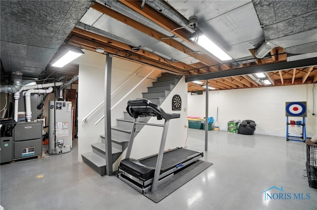 4329 Woodbriar Dr, Toledo, OH 43623 - workout area with gas water heater and heating unit