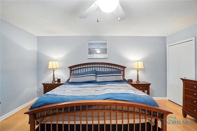 4329 Woodbriar Dr, Toledo, OH 43623 - bedroom with wood finished floors and a ceiling fan