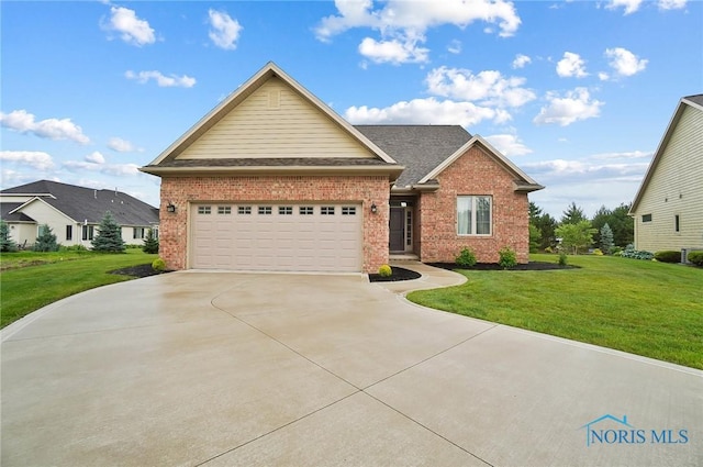 1635 Winterwood Ct, Bowling Green, OH 43402 - view of front of home featuring brick siding, driveway, a front yard, and an attached garage