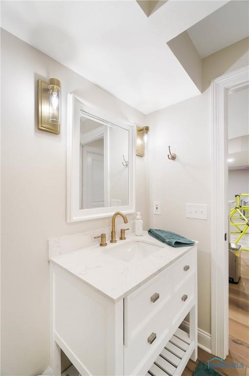 1635 Winterwood Ct, Bowling Green, OH 43402 - bathroom featuring vanity and wood finished floors