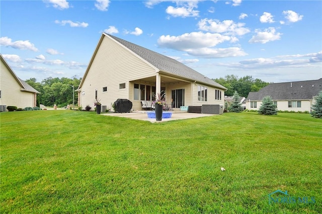 1635 Winterwood Ct, Bowling Green, OH 43402 - back of property featuring a patio and a yard