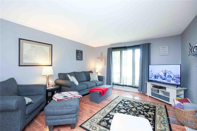 1932 Queenswood Dr Unit U5, Findlay, OH 45840 - living room with wood finished floors
