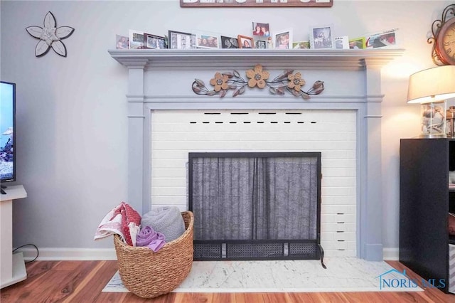1932 Queenswood Dr Unit U5, Findlay, OH 45840 - detailed view of wood finished floors and a fireplace