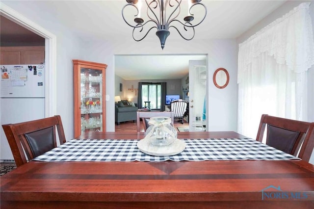 1932 Queenswood Dr Unit U5, Findlay, OH 45840 - dining space featuring a chandelier