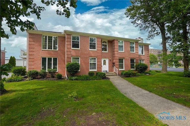 1932 Queenswood Dr Unit U5, Findlay, OH 45840 - multi unit property featuring brick siding and a front lawn