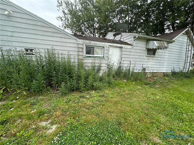 111 Bertha Ave, Clyde, OH 43410 - view of property exterior with a yard