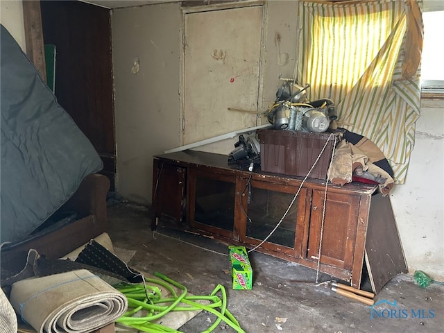 111 Bertha Ave, Clyde, OH 43410 - miscellaneous room with unfinished concrete floors