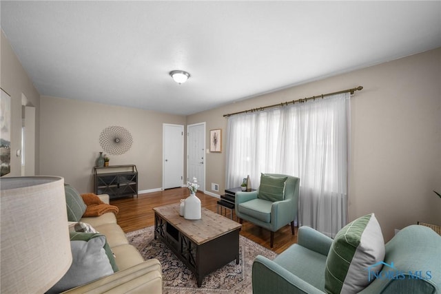 2058 Berkshire Pl, Toledo, OH 43613 - living room featuring wood finished floors and baseboards