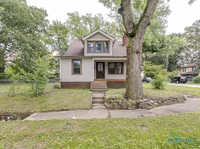 1302 Laning Rd, Toledo, OH 43615 - view of front of home with a chimney and covered porch