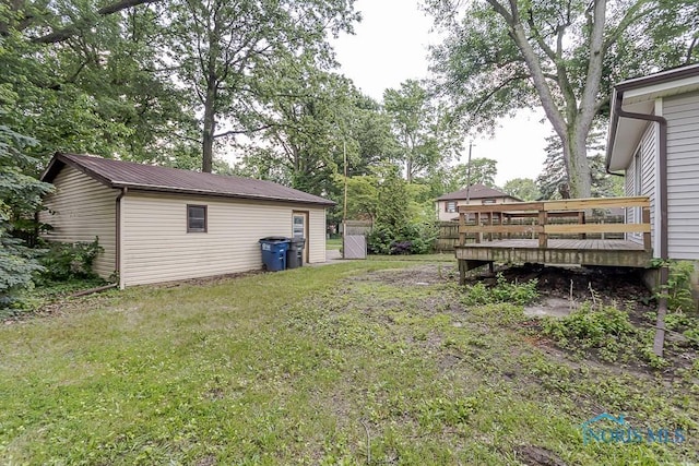 1302 Laning Rd, Toledo, OH 43615 - view of green lawn with a wooden deck