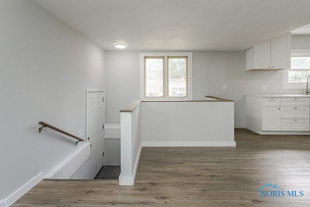 1302 Laning Rd, Toledo, OH 43615 - kitchen featuring wood finished floors and white cabinets