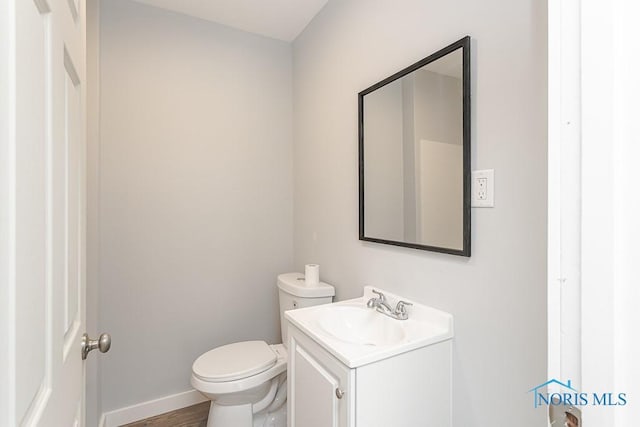 1302 Laning Rd, Toledo, OH 43615 - bathroom featuring vanity and wood finished floors
