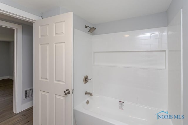 1302 Laning Rd, Toledo, OH 43615 - bathroom with shower / bath combination and wood finished floors