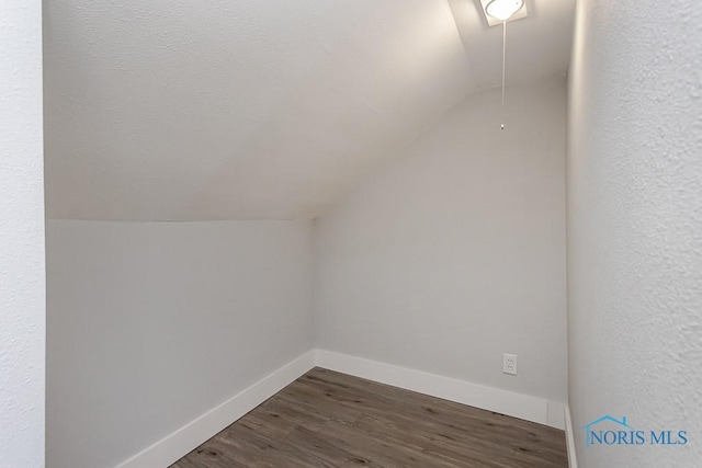 1302 Laning Rd, Toledo, OH 43615 - bonus room with vaulted ceiling and dark wood-style flooring