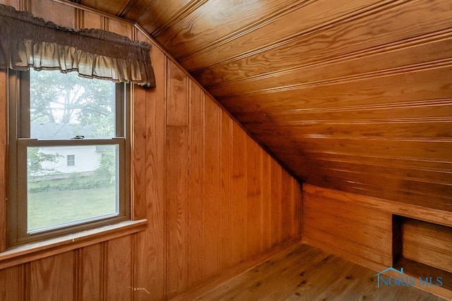1302 Laning Rd, Toledo, OH 43615 - bonus room with vaulted ceiling, wood walls, plenty of natural light, wooden ceiling, and wood finished floors