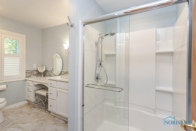 160 Wilkshire Dr, Waterville, OH 43566 - full bath with a shower stall, vanity, and decorative backsplash