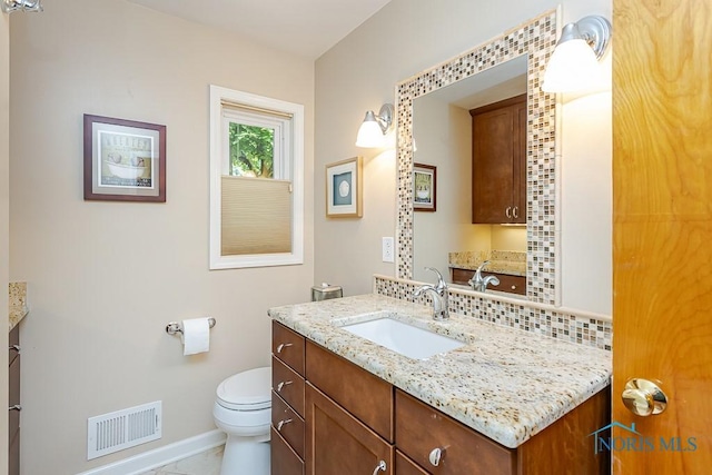 160 Wilkshire Dr, Waterville, OH 43566 - bathroom with vanity and backsplash