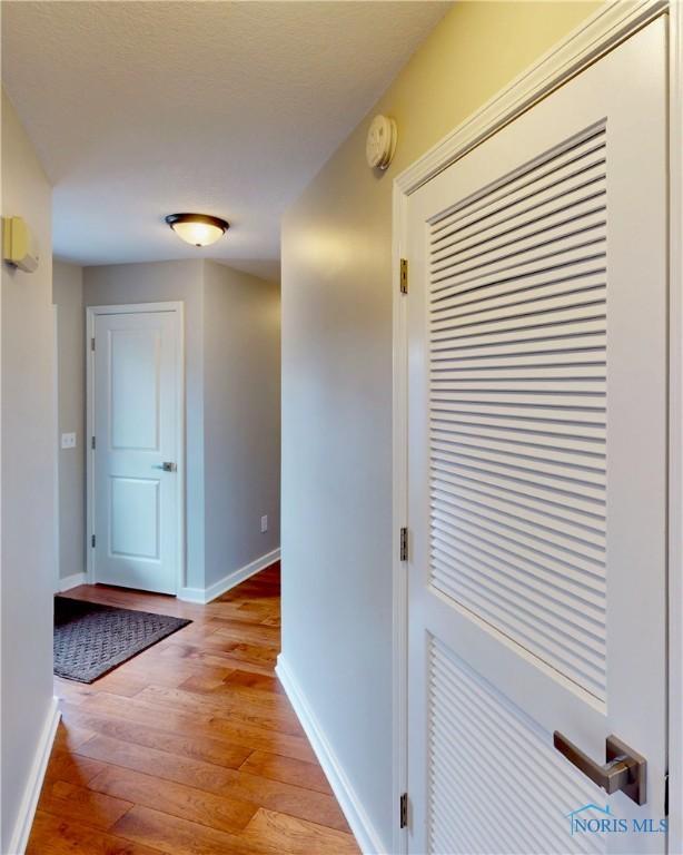 2109 Ottawa River Rd Unit 3C, Toledo, OH 43611 - hall with light wood-type flooring and baseboards